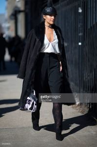 olivia-culpo-is-wearing-public-school-top-and-pants-eugenia-kim-hat-picture-id510290622.jpg