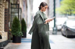 olivia-culpo-is-wearing-top-and-skirt-from-topshop-jacket-from-shoes-picture-id528322758.jpg