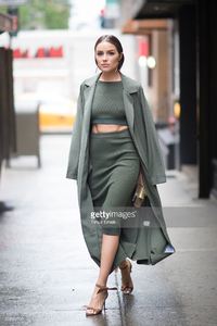 olivia-culpo-is-wearing-top-and-skirt-from-topshop-jacket-from-shoes-picture-id528322790.jpg
