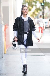 olivia-culpo-is-wearing-unravel-jacket-tops-pants-ralph-lauren-belt-picture-id541162000.jpg