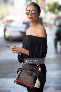 olivia-culpo-is-wearing-unravel-suede-pants-tibi-top-common-projects-picture-id540886214.jpg