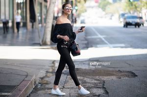 olivia-culpo-is-wearing-unravel-suede-pants-tibi-top-common-projects-picture-id540886220.jpg