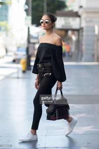 olivia-culpo-is-wearing-unravel-suede-pants-tibi-top-common-projects-picture-id540886270.jpg