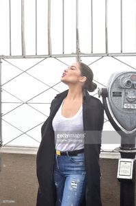olivia-culpo-lights-the-empire-state-building-at-the-empire-state-on-picture-id527700584.jpg