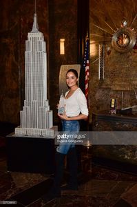 olivia-culpo-lights-the-empire-state-building-at-the-empire-state-on-picture-id527700618.jpg