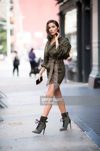 olivia-culpo-seen-wearing-a-khaki-dress-from-alexandre-vauthier-and-picture-id699321684.jpg