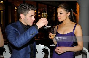 recording-artist-nick-jonas-and-miss-universe-2012-olivia-culpo-his-picture-id180773849.jpg