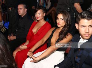 singer-demi-lovato-olivia-culpo-and-singer-nick-jonas-attend-the-2014-picture-id454107966.jpg