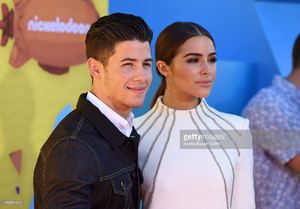 singer-nick-jonas-and-actress-olivia-culpo-arrive-at-nickelodeons-picture-id469331012.jpg