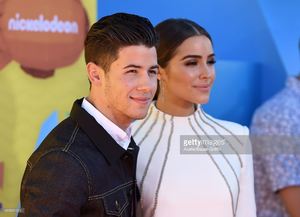 singer-nick-jonas-and-actress-olivia-culpo-arrive-at-nickelodeons-picture-id469331014.jpg