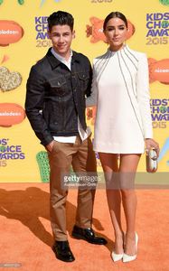 singer-nick-jonas-and-actress-olivia-culpo-arrive-at-nickelodeons-picture-id469331024.jpg