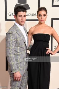 singer-nick-jonas-and-actress-olivia-culpo-attend-the-57th-annual-picture-id463013880.jpg