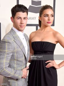 singer-nick-jonas-and-actress-olivia-culpo-attend-the-57th-annual-picture-id463017552.jpg