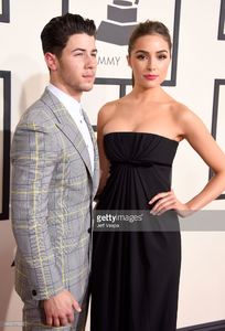 singer-nick-jonas-and-actress-olivia-culpo-attend-the-57th-annual-picture-id463017566.jpg