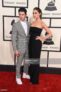 singer-nick-jonas-and-actress-olivia-culpo-attend-the-57th-annual-picture-id463017920.jpg