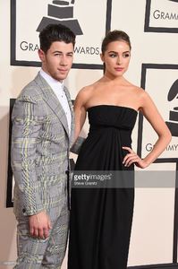 singer-nick-jonas-and-actress-olivia-culpo-attend-the-57th-annual-picture-id463017944.jpg