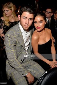 singer-nick-jonas-and-actress-olivia-culpo-during-the-57th-annual-picture-id463024154.jpg
