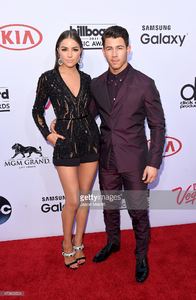singer-nick-jonas-and-model-olivia-culpo-attend-the-2015-billboard-picture-id473803524.jpg