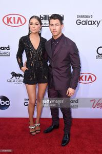 singer-nick-jonas-and-model-olivia-culpo-attend-the-2015-billboard-picture-id473817330.jpg