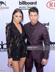 singer-nick-jonas-and-model-olivia-culpo-attend-the-2015-billboard-picture-id473879490.jpg
