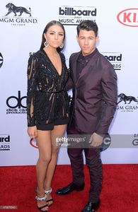 singer-nick-jonas-and-model-olivia-culpo-attend-the-2015-billboard-picture-id473879540.jpg