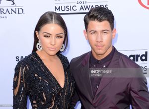 singer-nick-jonas-and-model-olivia-culpo-attend-the-2015-billboard-picture-id473879592.jpg