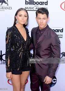singer-nick-jonas-and-model-olivia-culpo-attend-the-2015-billboard-picture-id473881038.jpg