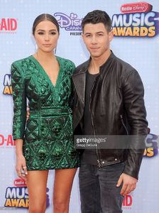 singer-nick-jonas-and-olivia-culpo-arrive-at-the-2015-radio-disney-picture-id471208172.jpg