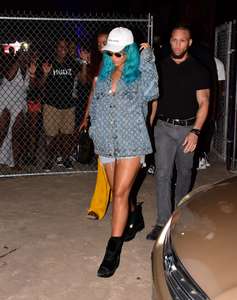 Rihanna--Wearing-a-turquoise-wig-at-a-carnival-event--09.jpg