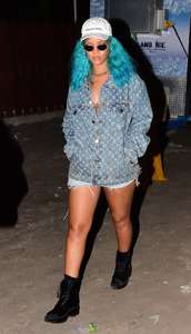 Rihanna--Wearing-a-turquoise-wig-at-a-carnival-event--10.jpg
