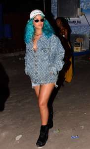 Rihanna--Wearing-a-turquoise-wig-at-a-carnival-event--17.jpg