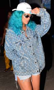 Rihanna--Wearing-a-turquoise-wig-at-a-carnival-event--21.jpg