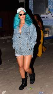 Rihanna--Wearing-a-turquoise-wig-at-a-carnival-event--22.jpg