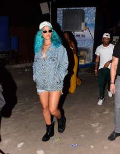 Rihanna--Wearing-a-turquoise-wig-at-a-carnival-event--28.jpg
