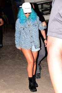 Rihanna--Wearing-a-turquoise-wig-at-a-carnival-event--29.jpg