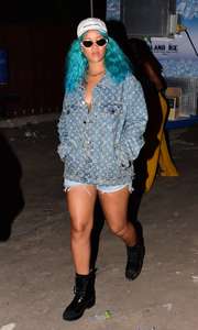 Rihanna--Wearing-a-turquoise-wig-at-a-carnival-event--34.jpg