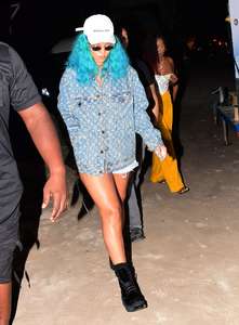 Rihanna--Wearing-a-turquoise-wig-at-a-carnival-event--37.jpg
