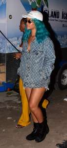 Rihanna--Wearing-a-turquoise-wig-at-a-carnival-event--41.jpg