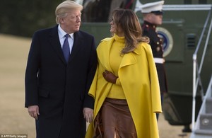 48E93BC900000578-5354089-First_lady_Melania_Trump_right_gives_President_Donald_Trump_left-a-90_1517873735980.jpg