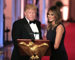 13555726-7034959-The_president_and_first_lady_share_a_moment_at_the_podium_on_Wed-a-27_1557977917877.jpg