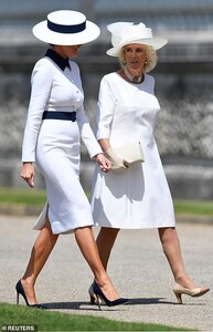 14298966-7098355-Mrs_Trump_and_the_Duchess_of_Cornwall_were_perfectly_co_ordinate-a-10_1559569206358.jpg