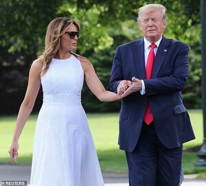 14956828-7155853-Hands_on_At_one_point_Trump_clasped_one_of_Melania_s_hands_in_bo-m-5_1560895009914.jpg