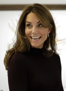 19487944-7553831-Kate_wore_a_huge_smile_during_her_visit_where_she_learned_about_-a-38_1570650027436.jpg