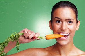 0015111754075_18_1266954-smiling-young-woman-eating-carrot-against-green-background-zoom_90.thumb.jpg.f9a222c0cf733cea168707e524fcdf3f.jpg