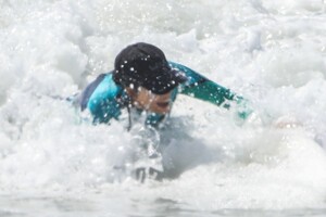 kourtney-kardashian-in-wetsuit-at-surf-lesson-in-malibu-09-27-2020-11.jpg