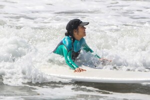 kourtney-kardashian-in-wetsuit-at-surf-lesson-in-malibu-09-27-2020-6.jpg