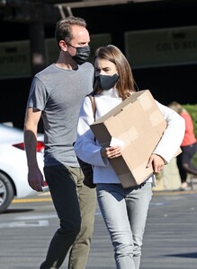 lily-collins-at-a-recycling-center-in-la-01-13-2021-9.jpg