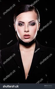 stock-photo-high-fashion-look-portrait-of-beautiful-brunette-girl-model-in-black-jacket-with-bright-makeup-99960497.jpg