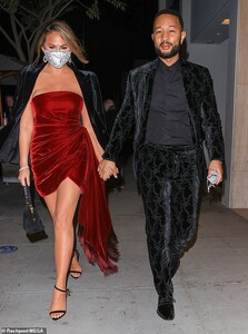 40478746-9362579-Celebration_Chrissy_Teigen_35_and_her_husband_John_Legend_42_had-m-4_1615791301119.jpg