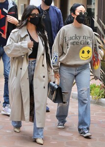 kourtney-kardashian-wears-a-plunging-black-crop-top-and-tan-trench-coat-at-taverna-tony-in-malibu-04-06-2021-0.jpg